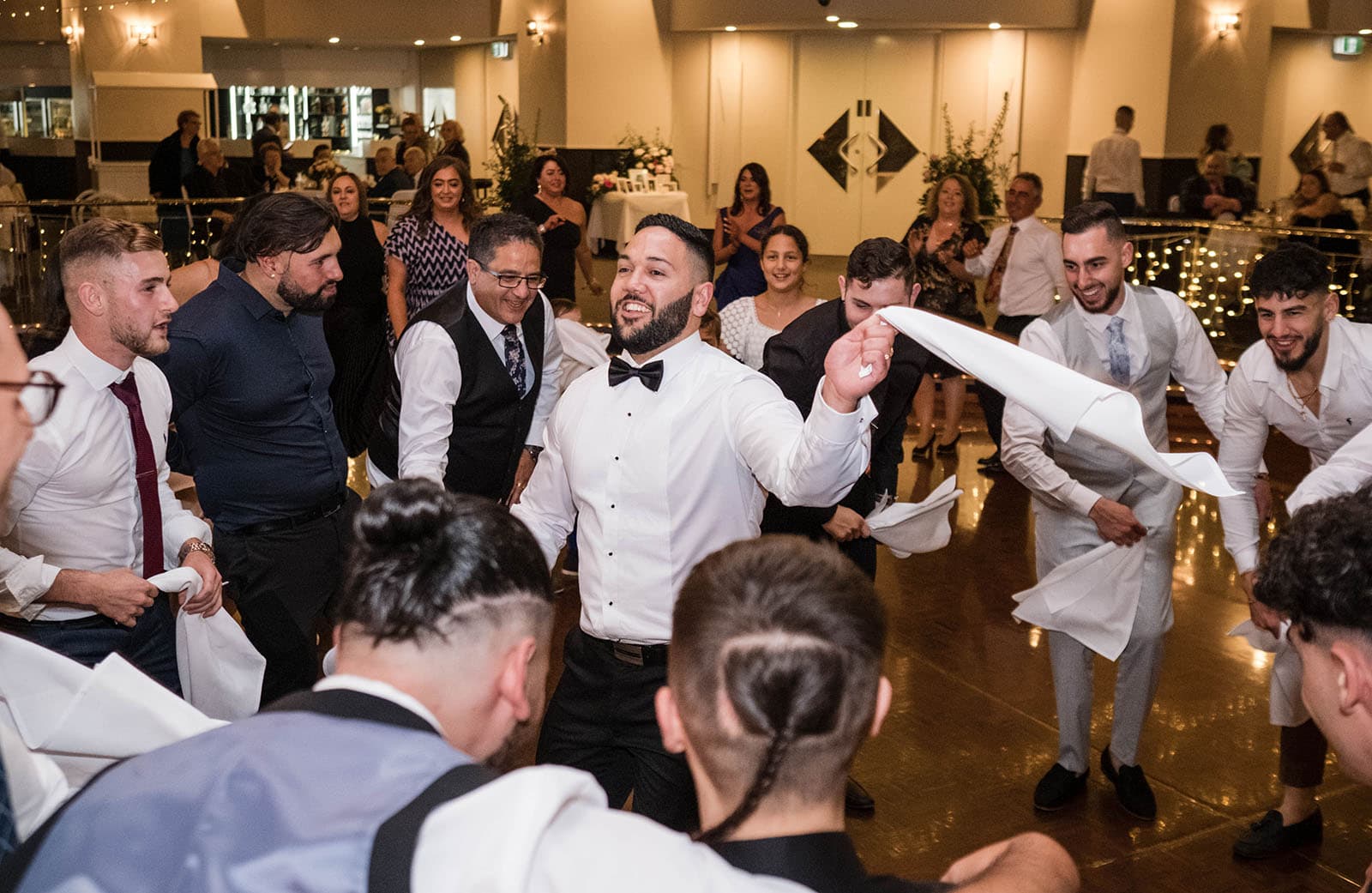 groom dancing with napkin Groom dancing with napkin